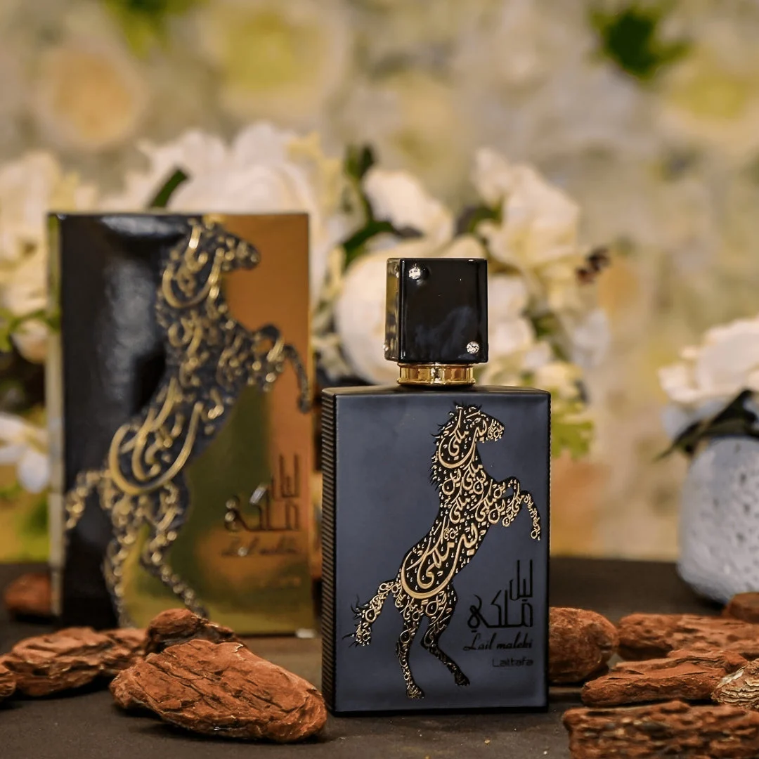 Lail Maleki Lattafa unisex edp black bottle box horse embossed gold near flowers