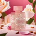 Badee Al Oud Noble Blush Lattafa pink perfume bottle surrounded roses petals almonds