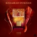 Khamrah Dukhan Lattafa unisex edp glass bottle red dried leaves smoking closeup