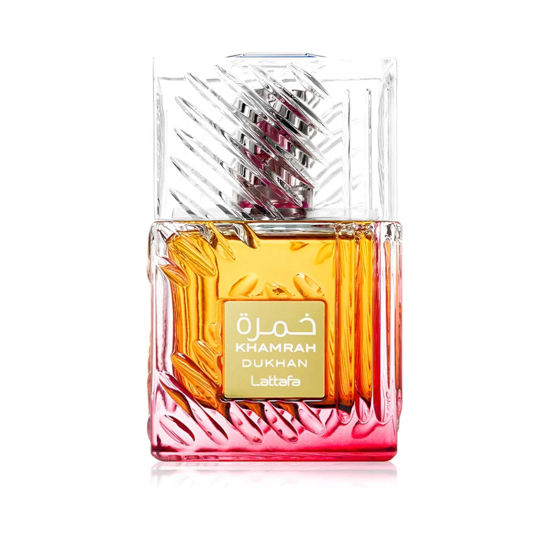 Khamrah Dukhan Lattafa bottle white background closeup front side low light reflection