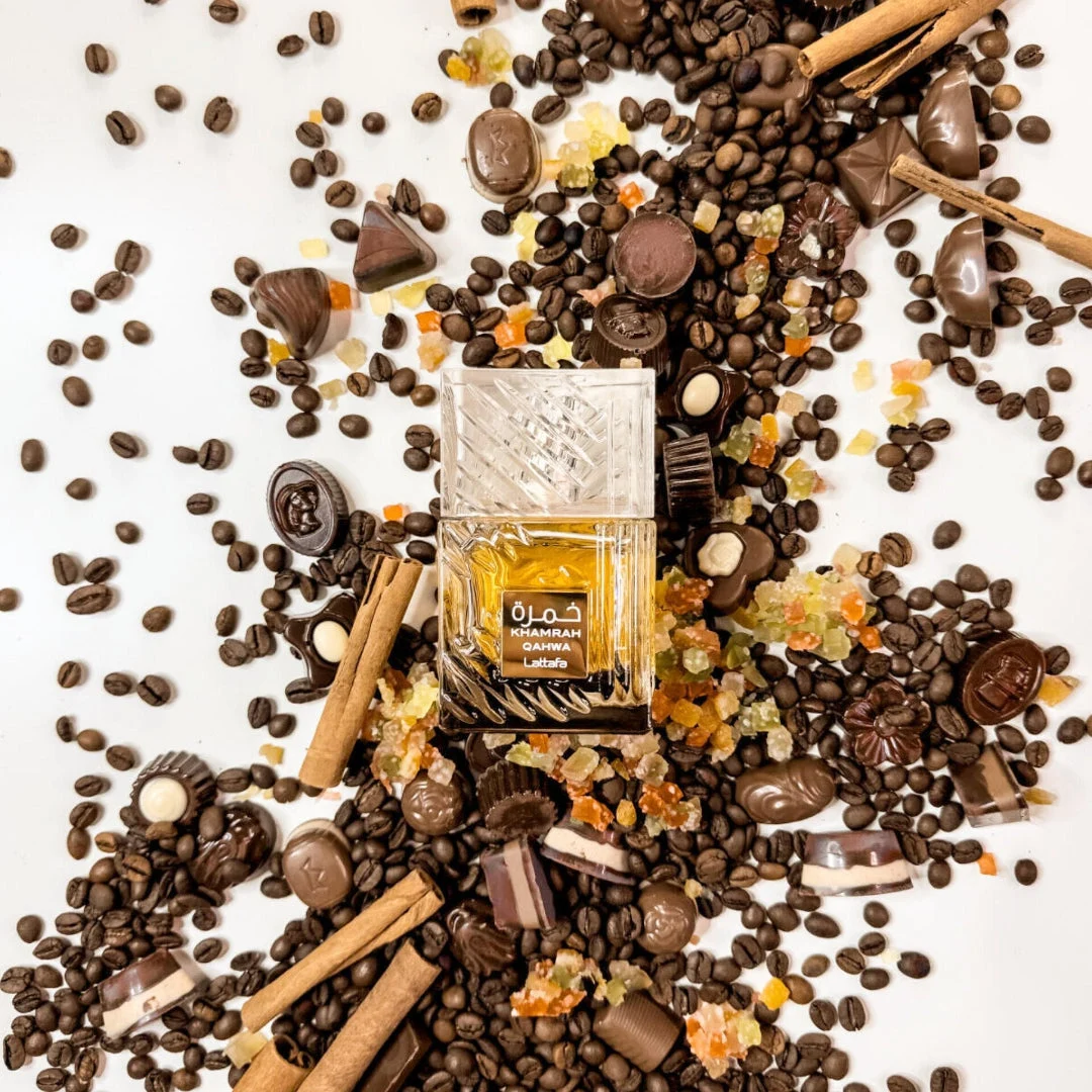 Khamrah Qahwa Lattafa edp unisex perfume bottle surrounded chocolates coffee beans cinnamon