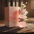 Yara Lattafa edp pink fragrance elegant setting surrounded jasmine flowers and vanilla wafer