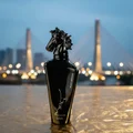 Maahir Black Edition Lattafa black fragrance sleek glass wet sand dusk nearby bridge