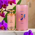 Mayar Lattafa edp woman pink glass elegant packaging surrounded purple orchids marble surface