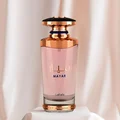 Mayar Lattafa edp woman pink glass fragrance spray white cloth closeup front golden