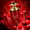 Mayar Cherry Intense Lattafa perfume bottle surrounded cherries water splash red background
