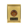 Oud Al Sahraa Lattafa gold packaging unisex edp white background closeup