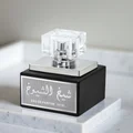 Lattafa sheikh al shaykh eau de parfum men in black square glass bottles closeup view