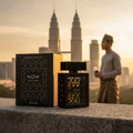 Now Rave Lattafa cologne black packaging ledge overlooking cityscape sunset Malaysia