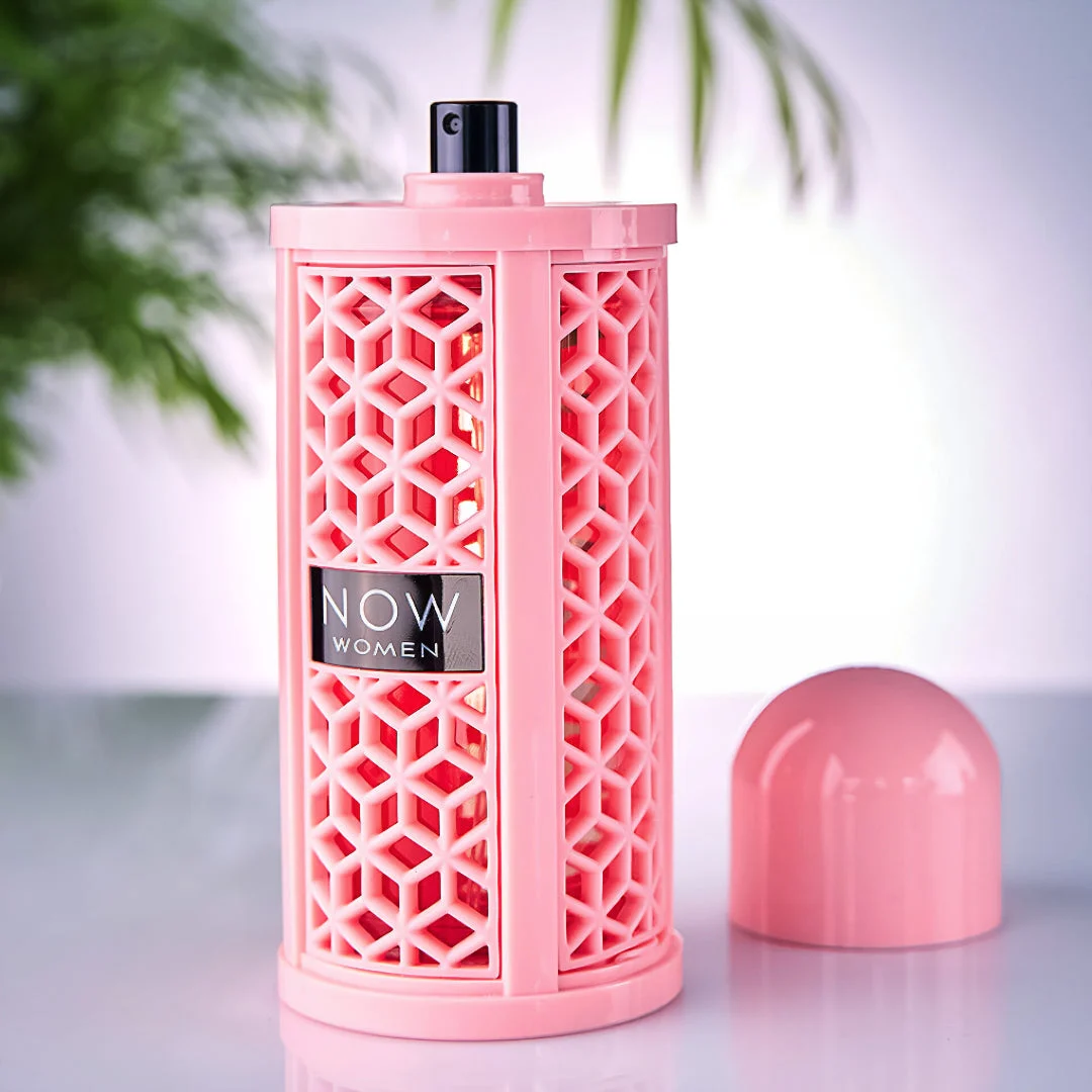 Now Women Rave Lattafa edp honeycomb design cylindrical pink case closeup front