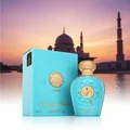 Opulent Dubai Lattafa perfume boxed in front mosque sunset background lake