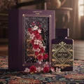 Badee Al Oud Amethyst Lattafa purple unisex fragrance carpeted floor nearby flowers