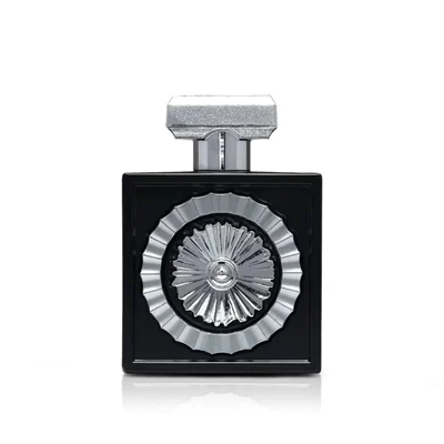 Wajood Lattafa eau de parfum black bottle silver ornament minimalist white light reflection