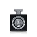 Wajood Lattafa eau de parfum black bottle silver ornament minimalist white light reflection