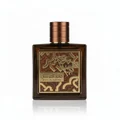 Qaed Al Fursan Untamed Lattafa edp perfume brown glass square shaped bottle copper cap closeup