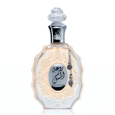Lattafa Rouat Al Musk women fragrance in a decorative glass clear light orange coloured bottle