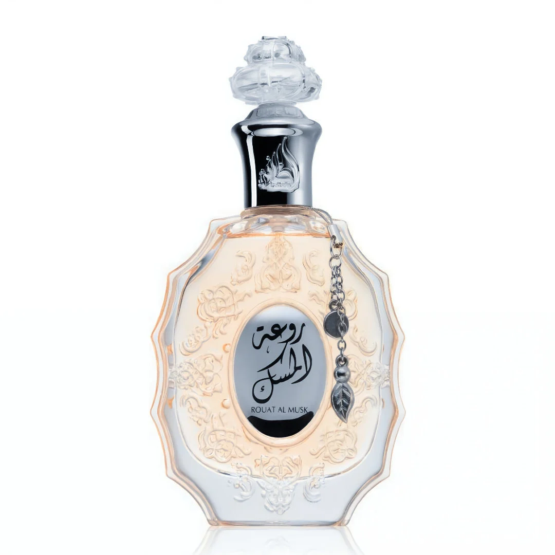Lattafa Rouat Al Musk women fragrance in a decorative glass clear light orange coloured bottle