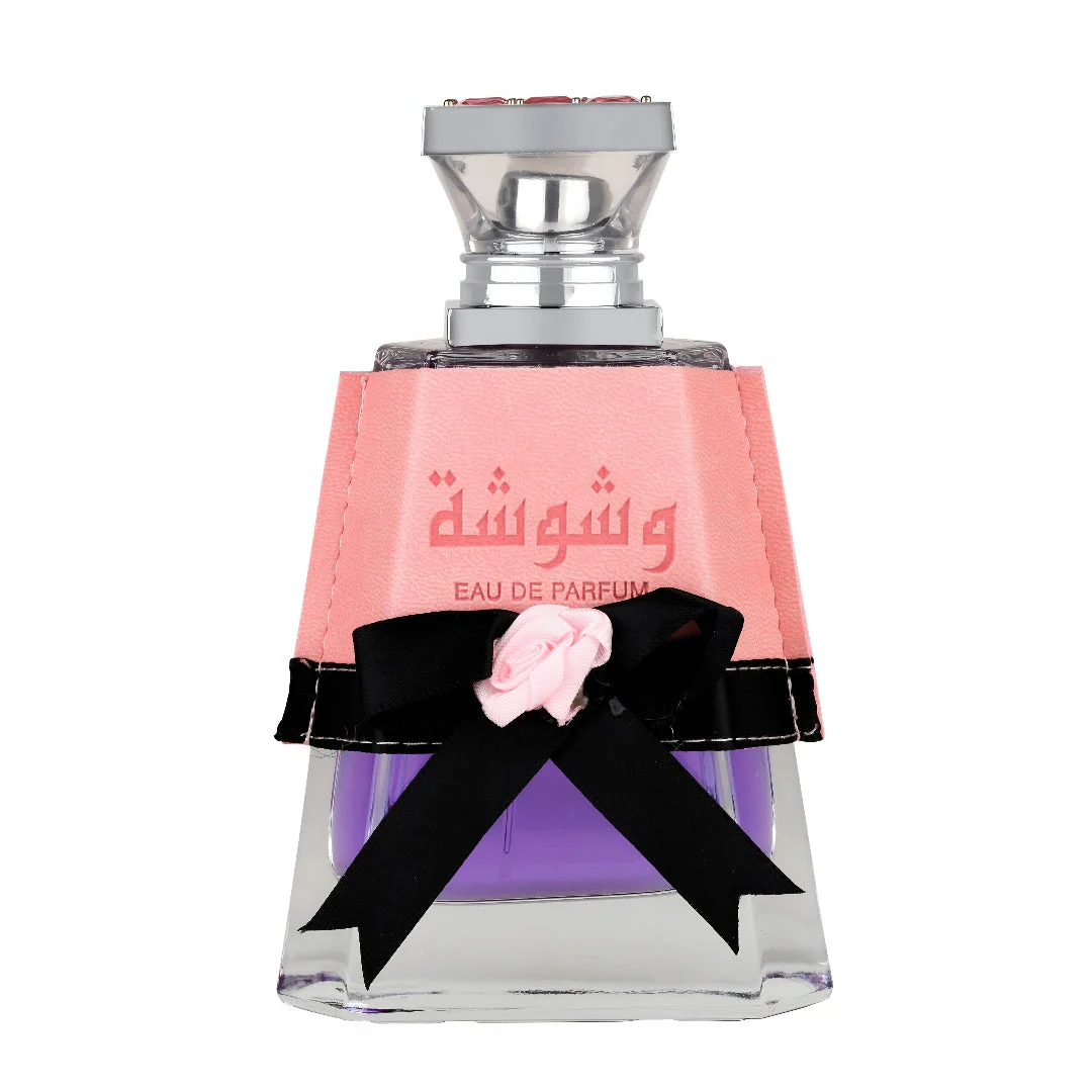 Lattafa Washwasha eau de parfum purple liquid in clear glass elegant pink cover black ribbon