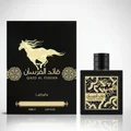 Qaed Al Fursan Lattafa perfume bottle and box black horse design golden jumping