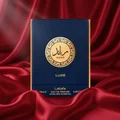 Raed Luxe Lattafa perfume packaging on red silk background closeup front side low angle