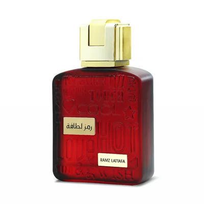 Red glass Lattafa ramz gold woman edp fragrance perfumes bottles closeup view front side profile