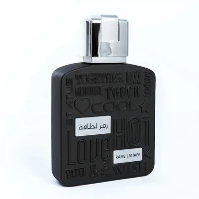 Lattafa ramz silver edp men's fragrance in black sleek rectangular shaped glass perfumery bottles closeup