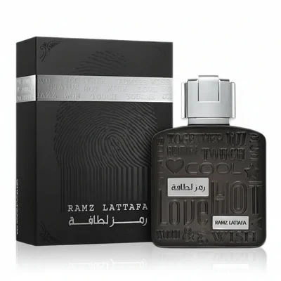 Lattafa Ramz Silver edp black sleek packaging on white background closeup view of bottle