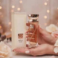 Reve Rose Vurv Lattafa edp glass pinkish brown elegant fragrance packaging surrounded roses