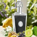 Taweel Lattafa unisex edp surrounded fruits flowers greenery closeup silver cap black label