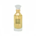Lattafa Velvet oud unisex fragrance in a glass yellow liquid filled crystal clear elegant gold caped