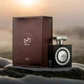 Wajood Lattafa eau de parfum black silver bottle and brown box on morning snow