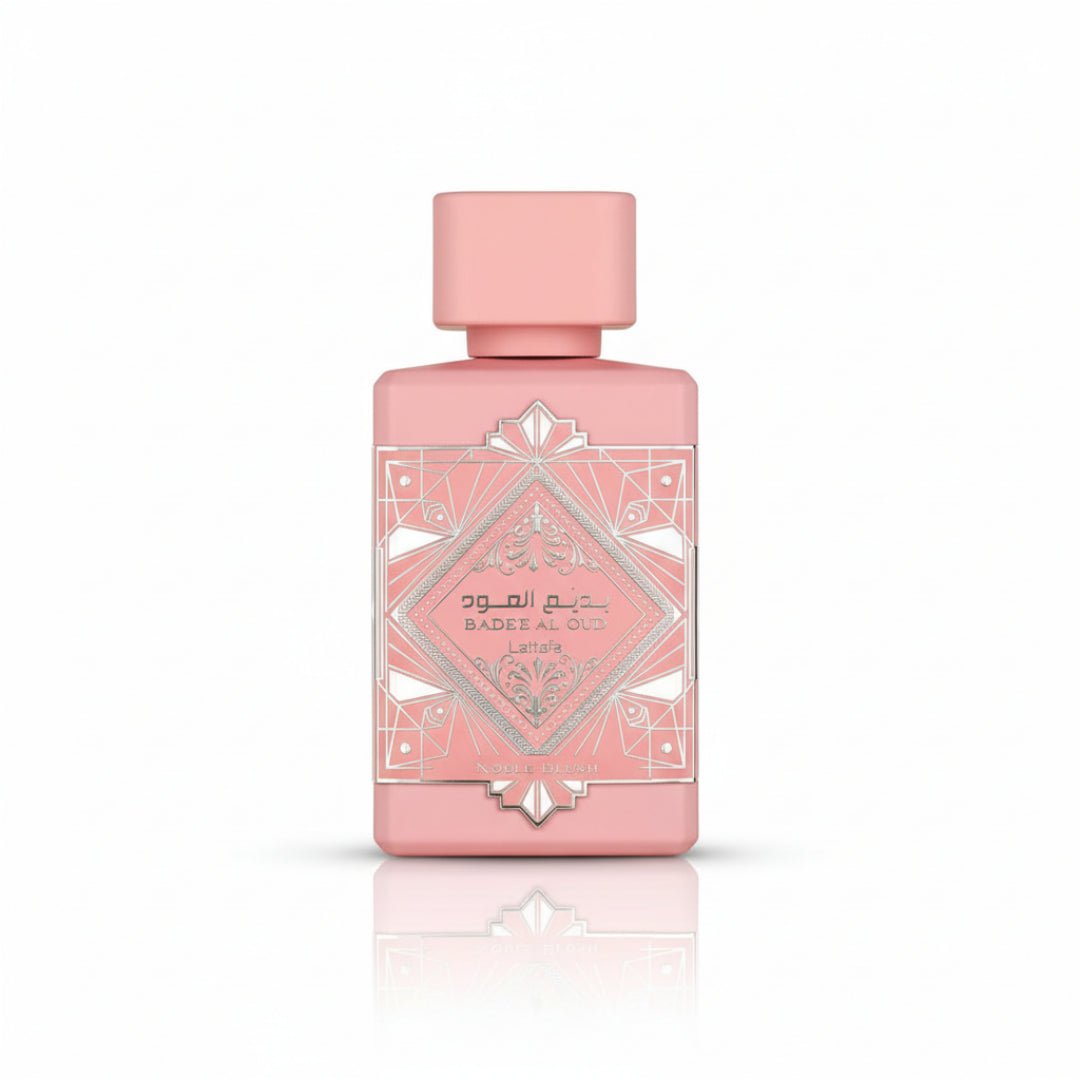 Badee Al Oud Noble Blush Lattafa pink perfume elegan dekat depan botol