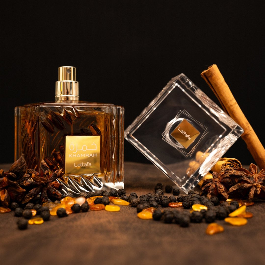 Khamrah Lattafa unisex edp surrounded spices wooden table closeup side front brown