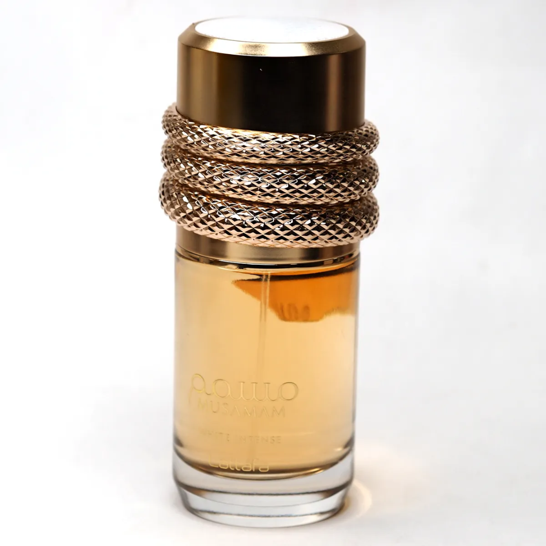 Layering Lattafa's Musamam Intense and Najdia in Gold: A Unique Blend of Woody, Fresh, and Amber Notes