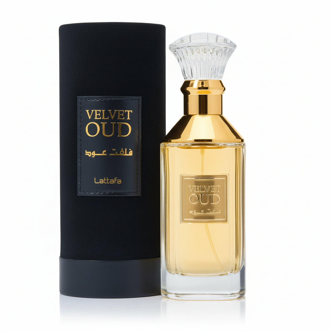 Lattafa Velvet Oud botol kaca emas spray uniseks sebelah tiub hitam dekat