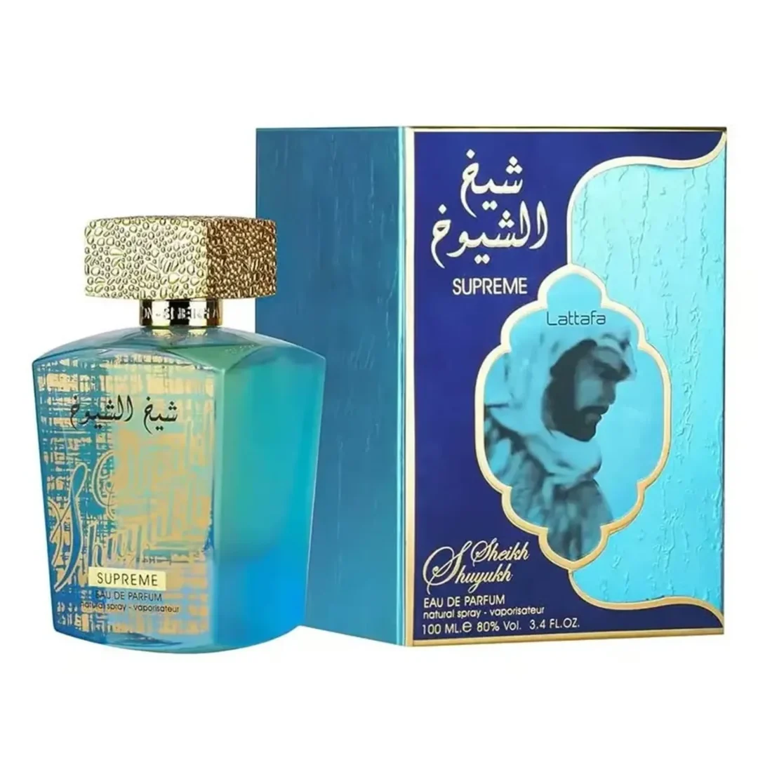 Lattafa Sheikh Al Shuyukh Supreme by Lattafa 100ml — A blue box with Arabic calligraphy and a portrait of a man in a headscarf is next to a clear glass perfume bottle with a gold textured cap and light green liquid. | Lattafa Sheikh Al Shuyukh Supreme by Lattafa 100ml — Kotak biru dengan kaligrafi Arab dan potret