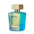 Lattafa Sheikh Al Shuyukh Supreme by Lattafa 100ml — A blue box with Arabic calligraphy and a portrait of a man in a headscarf is next to a clear glass perfume bottle with a gold textured cap and light green liquid. | Lattafa Sheikh Al Shuyukh Supreme by Lattafa 100ml — Kotak biru dengan kaligrafi Arab dan potret