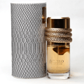 Musamam Intense Lattafa gold fragrance cylindrical snakeskin case white background closeup