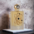 Tharwah Gold Lattafa Pride edp golden fragrance marble stand grey background closeup front side