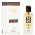 Lattafa Ana Abiyedh Leather 60ml — White perfume box and glass bottle with gold accents and Arabic calligraphy, showing the product packaging and bottle design. | Kotak minyak wangi putih dan botol kaca dengan aksen emas dan kaligrafi Arab, menunjukkan pembungkusan produk dan reka bentuk botol.