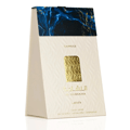 Al Nashama Caprice Lattafa edp packaging white background closeup side view