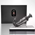 Niche Emarati Khanjar by Niche Emarati 85ml EDP — Black box with silver label and ornate dagger-shaped perfume bottle