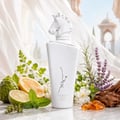 Lattafa Maahir Honor 100ml by Lattafa — White perfume bottle with a horse head stopper, tied with a white ribbon, inside an open white box with a cutout flap | Lattafa Maahir Honor 100ml by Lattafa — Botol minyak wangi putih dengan penutup kepala kuda, diikat dengan reben putih, di dalam kotak putih terbuka dengan