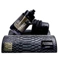 Lattafa Musamam Black Intense 100ml by Lattafa — Black snake coiled around a dark perfume bottle, with a textured black case in the background. | Lattafa Musamam Black Intense 100ml by Lattafa — Ular hitam melilit botol minyak wangi gelap, dengan bekas bertekstur hitam di latar belakang.