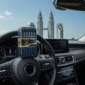 Al Azal Lattafa edp on car steering wheel kuala lumpur cityscape view