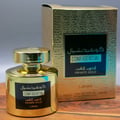 Confidential Private Gold Lattafa edp wooden table next golden packaging boxes