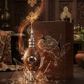 botol perfume Hala Lattafa dalam kotak kayu, serpihan kaca meletup, asap naik