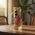 Jasoor Lattafa perfume in gold vase wooden table surrounded flowers petals window seat