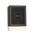 Khamrah Lattafa black gift box on wooden block white background closeup front view