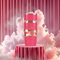 Yara Candy Lattafa pink perfume bottle on pedestal surrounded cloudy backdrop Malaysia setting
